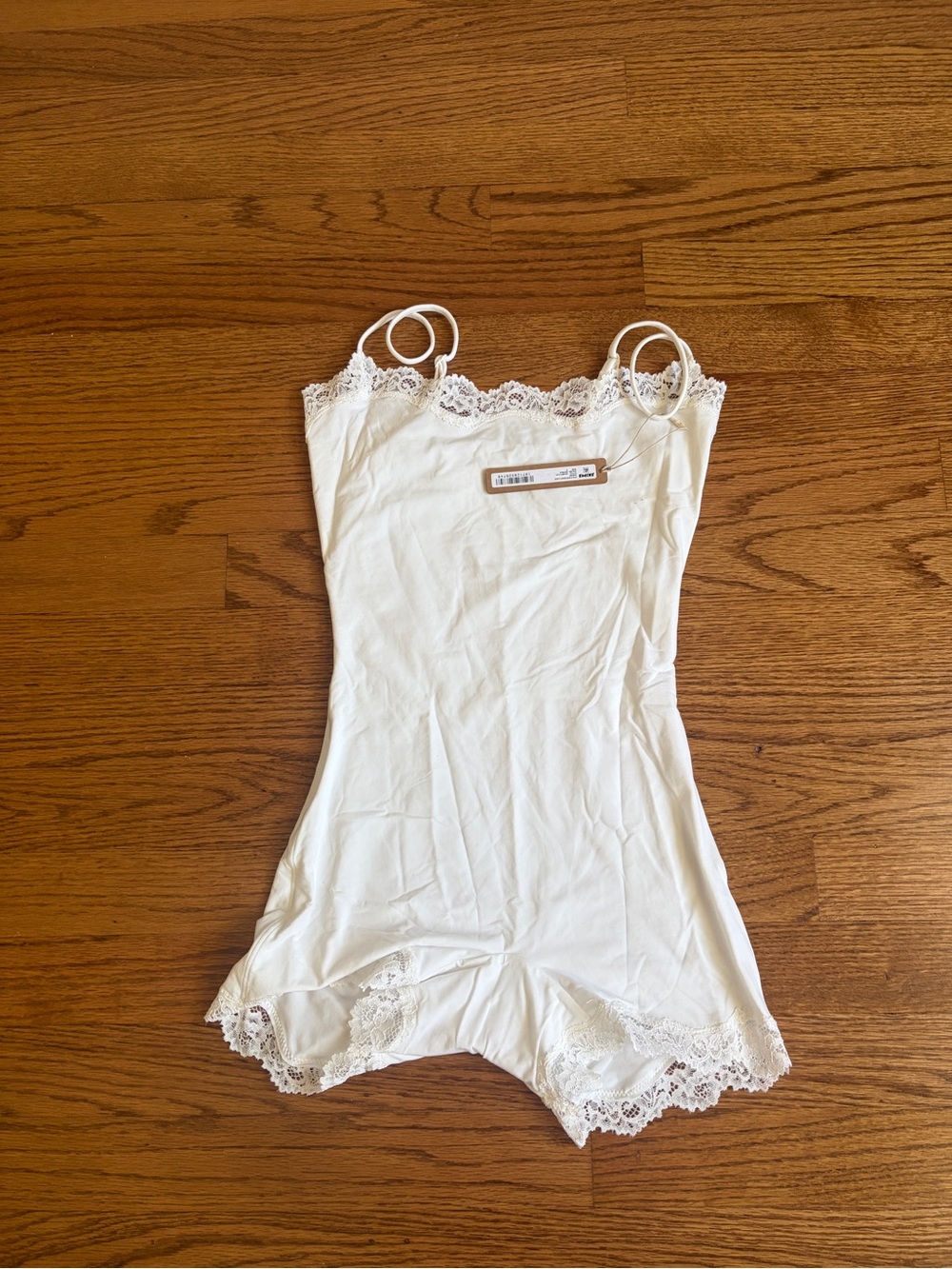 SKIMS White Lace-Trim Slip Romper